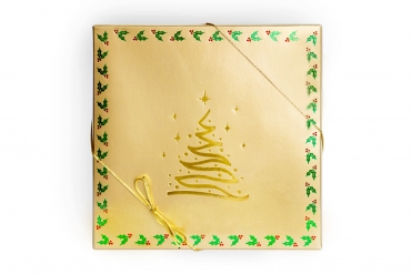 starlight gift box, gold top with black 4-part bottom, tied with a gold elastic ribbon. Photo taken on a white background
